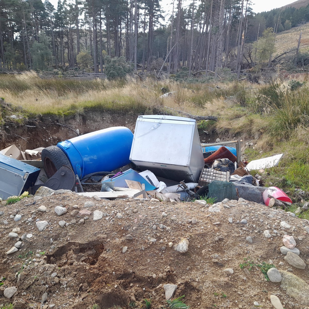 General & hazardous waste, including  bags of suspected shot gamebirds, found dumped in a pit on an estate in&nbsp;Scotland